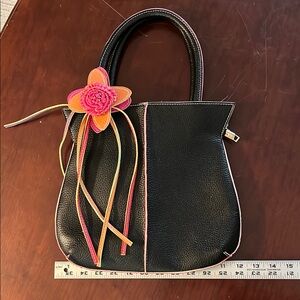 Black Handbag with Colorful Flower Accent